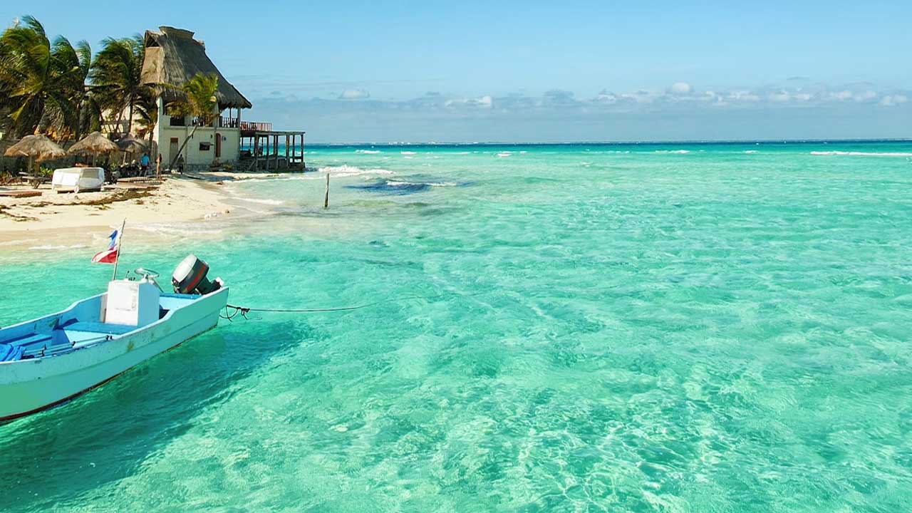 2 Disfruta de nuestro tour de 11 días por Cancún. Playas de ensueño, ruinas mayas y vida nocturna vibrante, todo incluido.